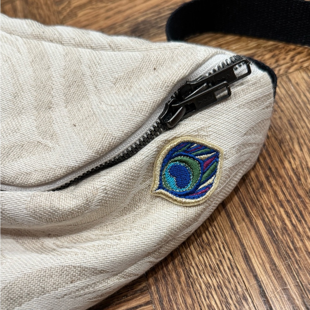 Chic Cream Crossbody Bag with Peacock Detail